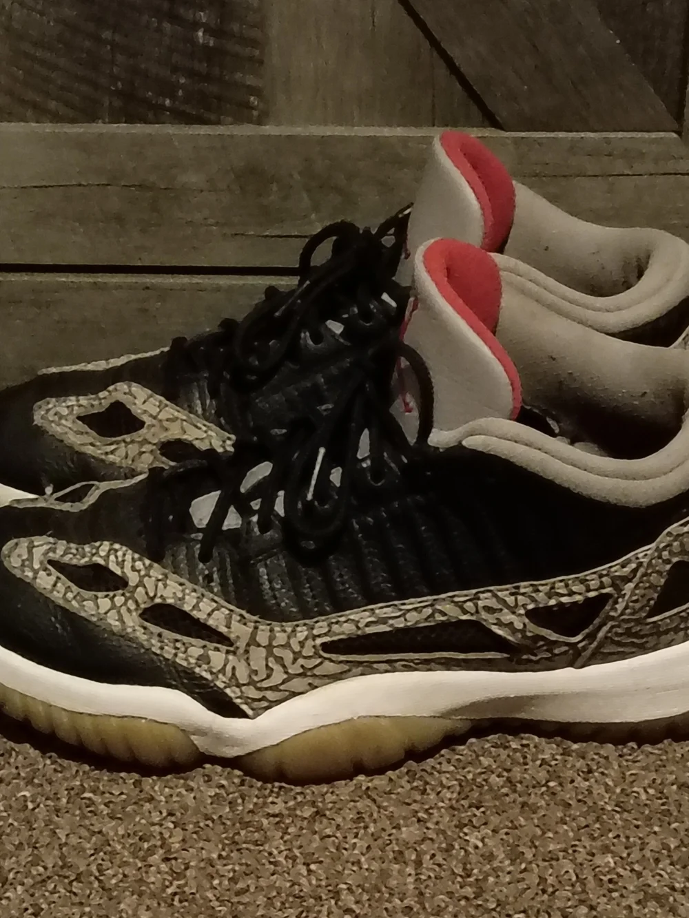 Jordan 11 Retro Low IE sneakers in Black, White and Red